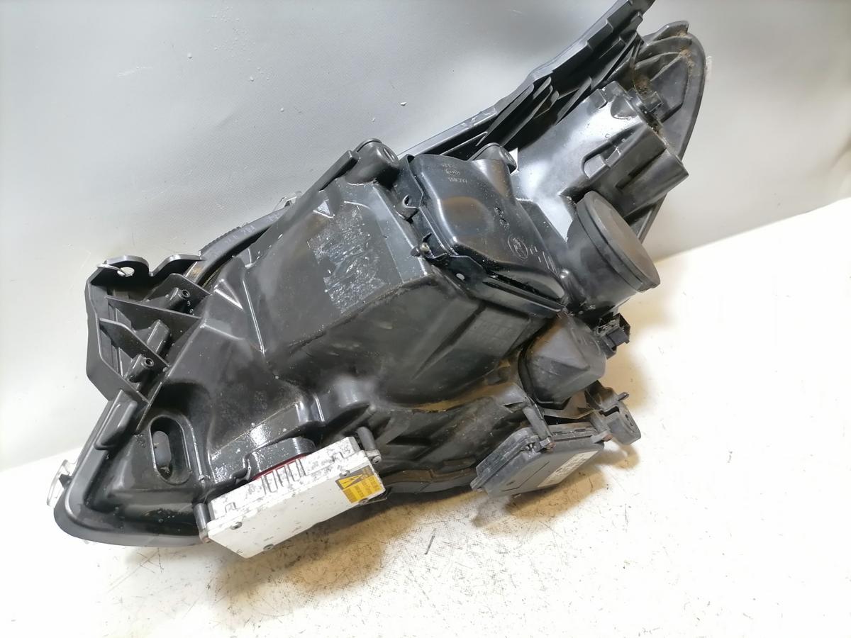 Opel Astra H original Xenonscheinwerfer rechts mit Kurvenlich schwarzer Hintergrund Bj.2009